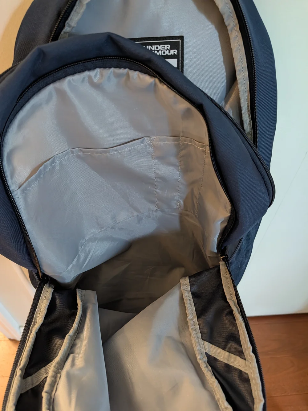 Under Armour Hustle 5.0 Navy blue Backpack with Silver Logo